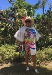 Kentucky Derby hat and bold print dress