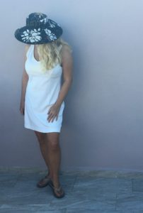 Cotton dress, wide brim hat, and comfy flip flops for casual Kentucky Derby themed party